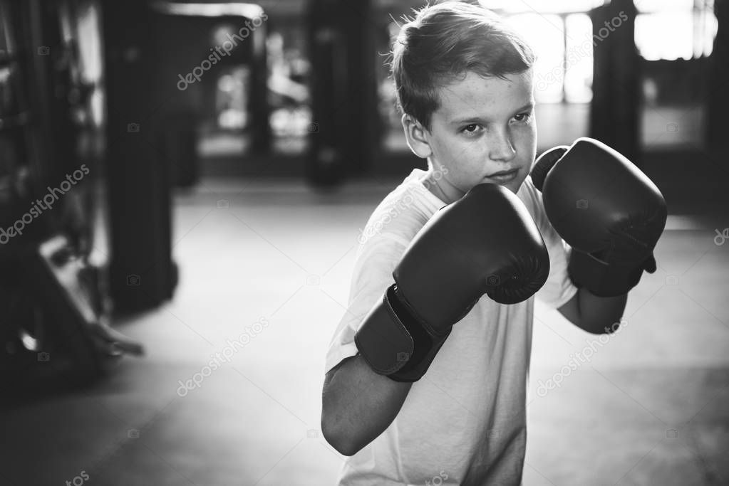 Boy Training Boxing Exercis