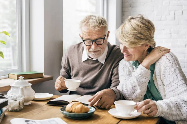 Senior couple having morning breakfast — Stock Photo, Image