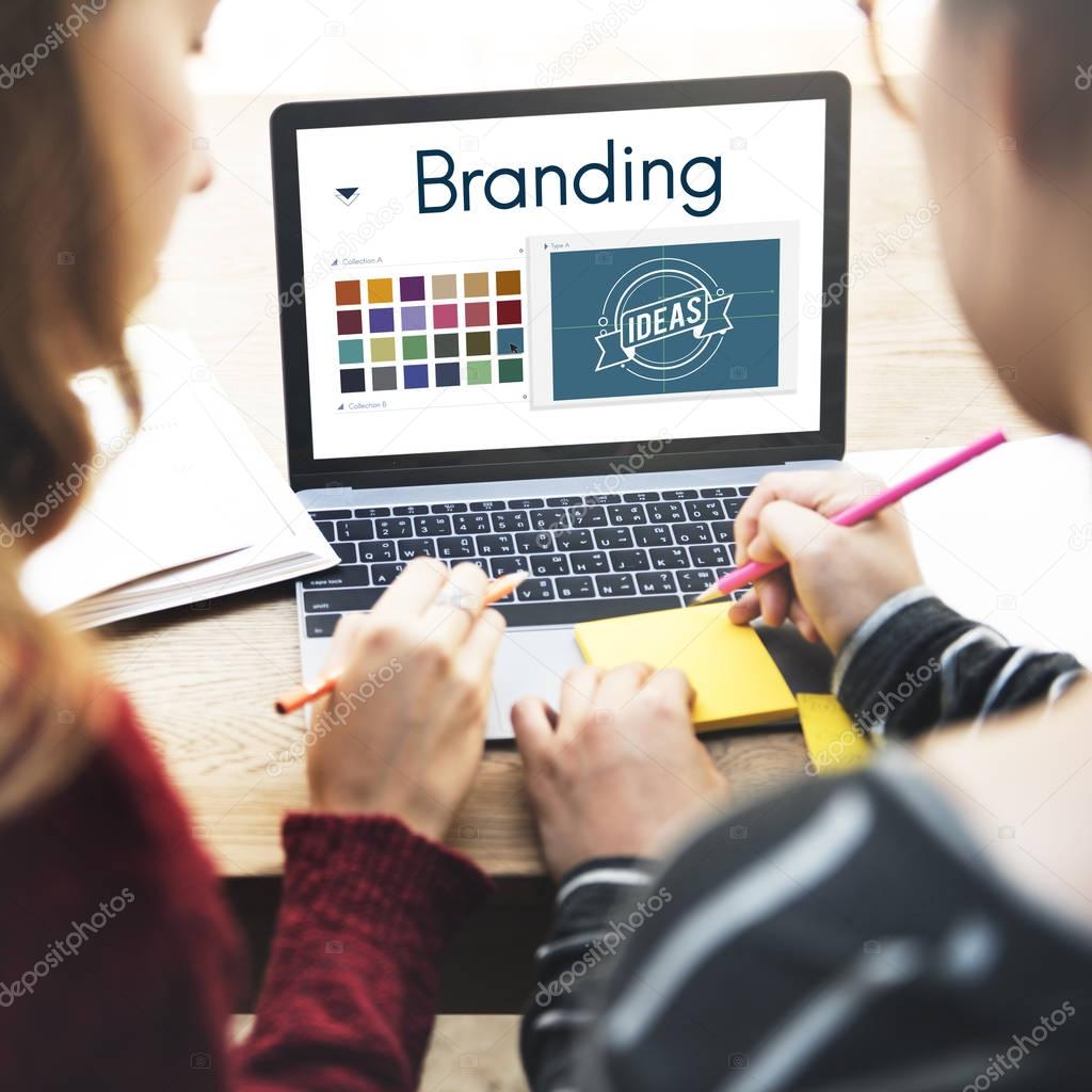 Young girls using digital device, concept Branding