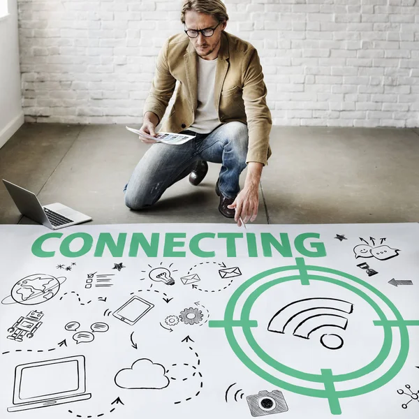 Businessman working near poster — Stock Photo, Image