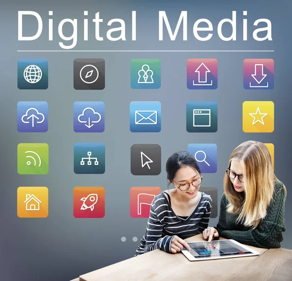 Young girls using digital device — Stock Photo, Image