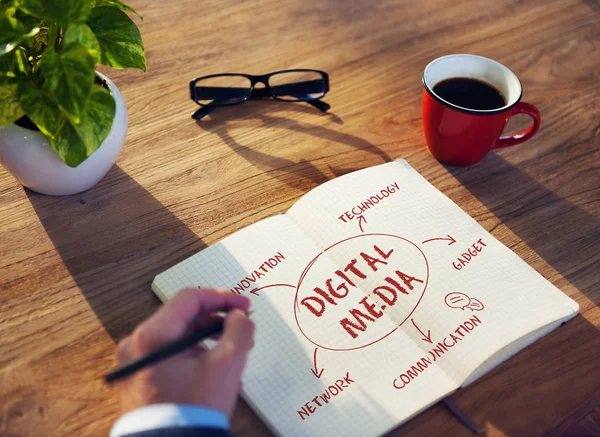 Businessman writing notes in diary — Stock Photo, Image