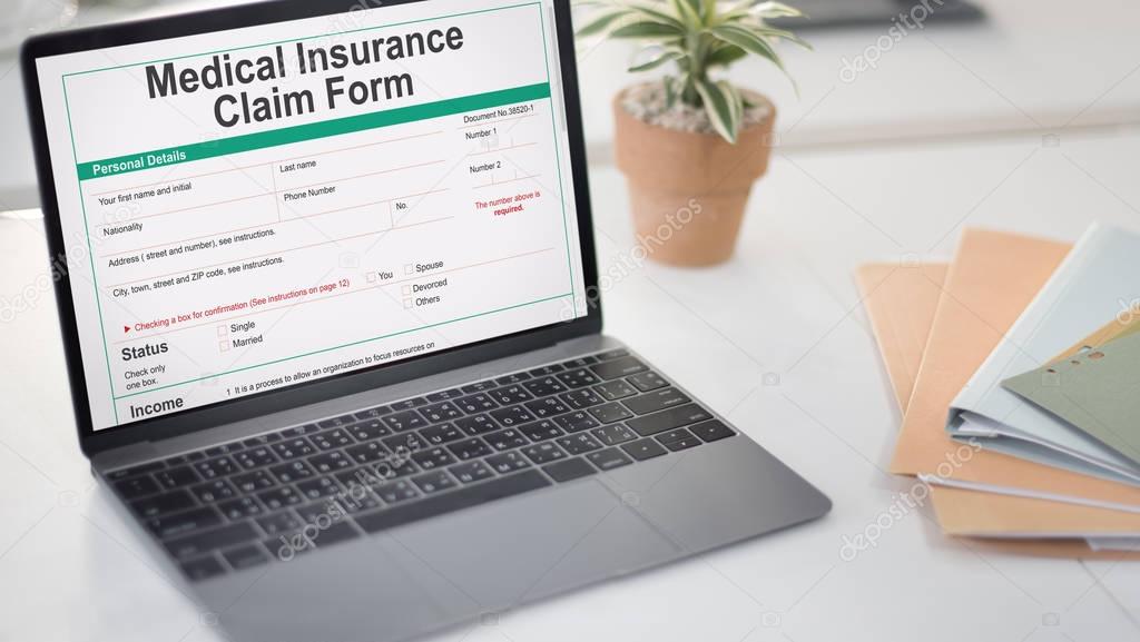 Medical Insurance Claim Form on monitor Concept