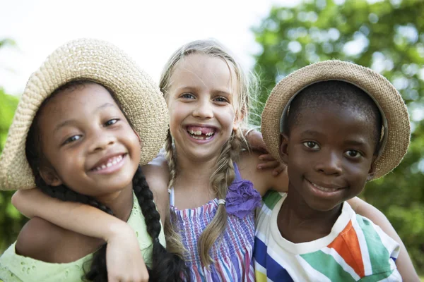 Multiethnic children outdoors Royalty Free Stock Photos