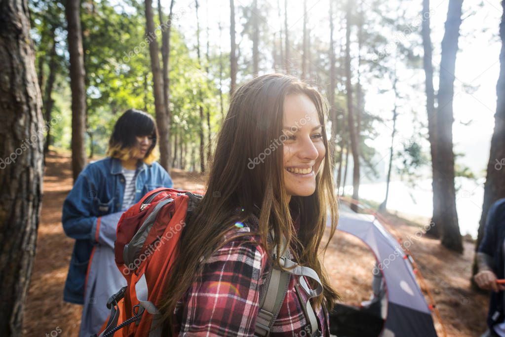 Young Friends Travelers in Forest