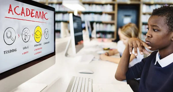 Pupils studying with computers — Stock Photo, Image