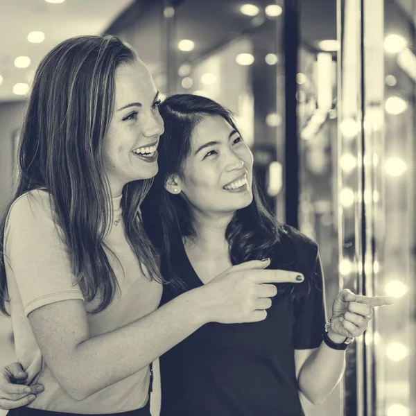 Beautiful women in shopping mall — Stock Photo, Image