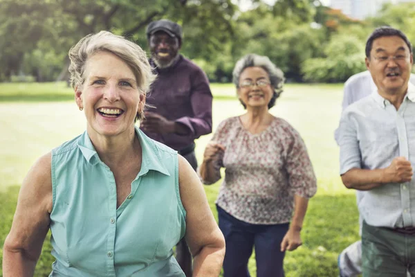 Senior Friends have fun at park — Stock Photo, Image