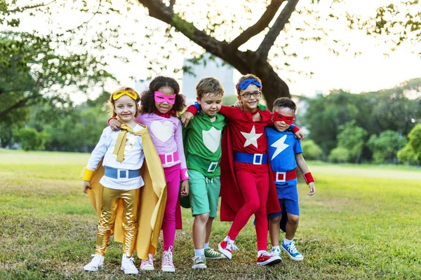 Superhero Kids playing together — Stock Photo, Image