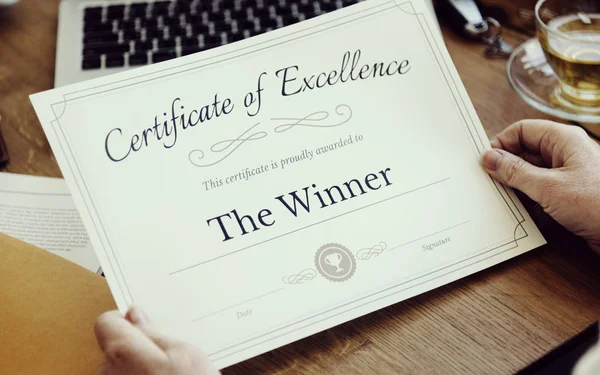 Person Holding winner Certificate — Stock Photo, Image
