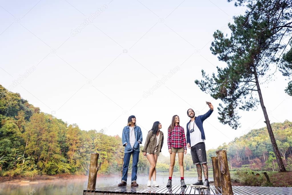 Young Friends near Lake 