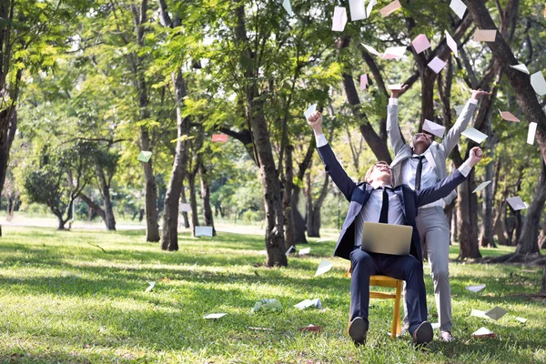 Business people throwing documents — Stock Photo, Image