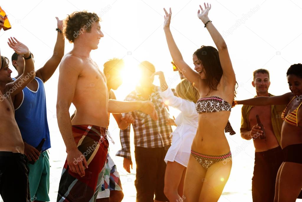 People enjoying beach party