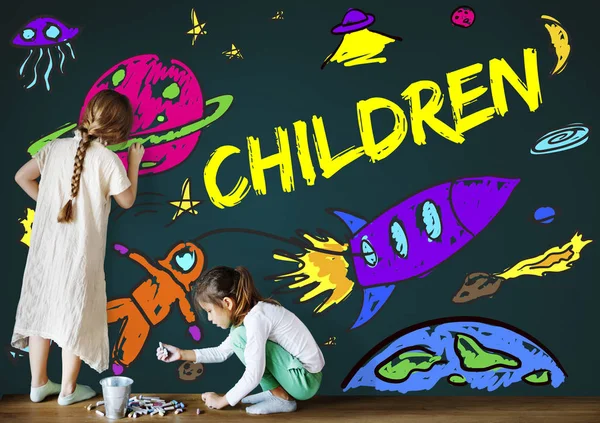 Kids drawing on blackboard — Stock Photo, Image