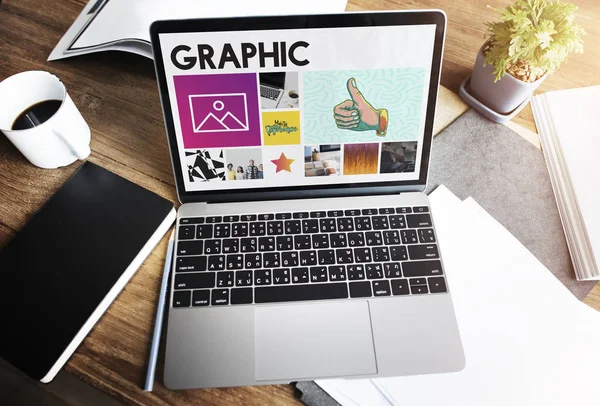 Laptop on table with coffee cup — Stock Photo, Image