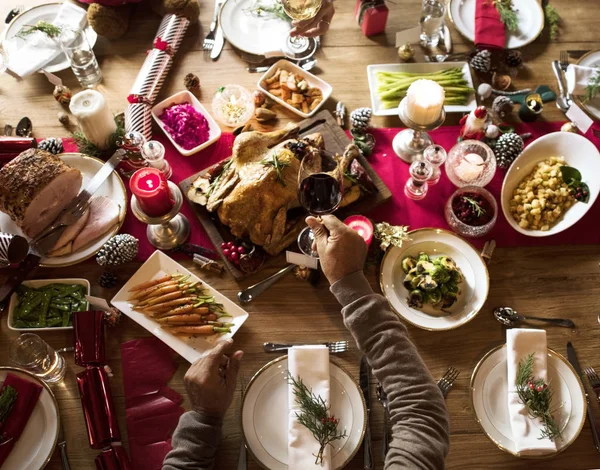 Family at table with a festive dinner — Stock Photo, Image