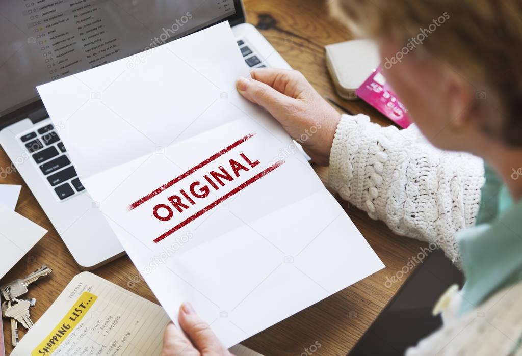 woman holding paper document