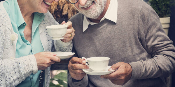 Elderly couple drinking tea