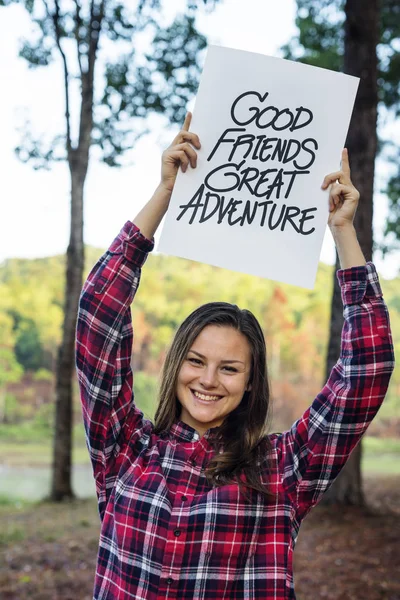 Woman holding board — Stock Photo, Image