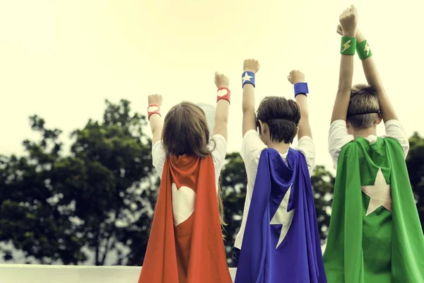 Kids in costumes superheroes — Stock Photo, Image