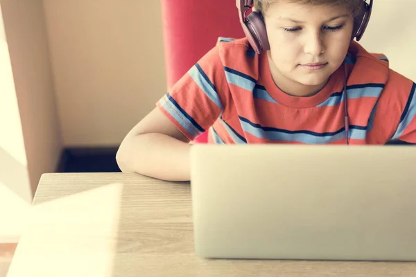 Boy in Headphone Using Laptop — Stock Photo, Image