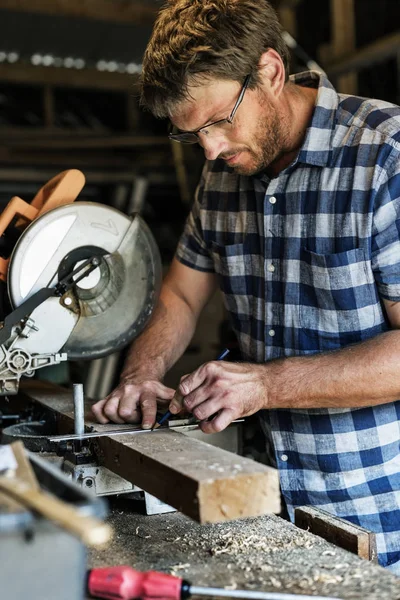 Carpenter Craftman in workshop — Stock Photo, Image