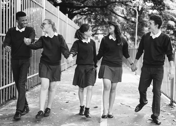 Diversi studenti in uniforme College — Foto Stock