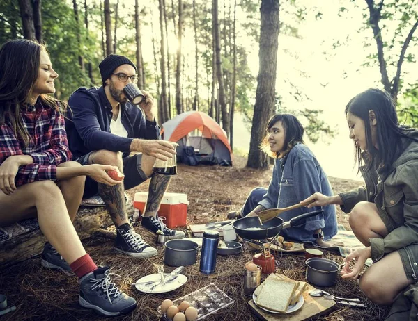 Young friends travelers in forest — Stock Photo, Image