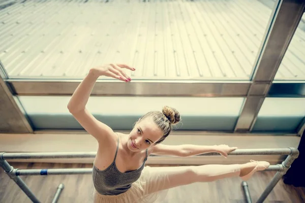 Ballerina stretching in Ballet School — Stock Photo, Image