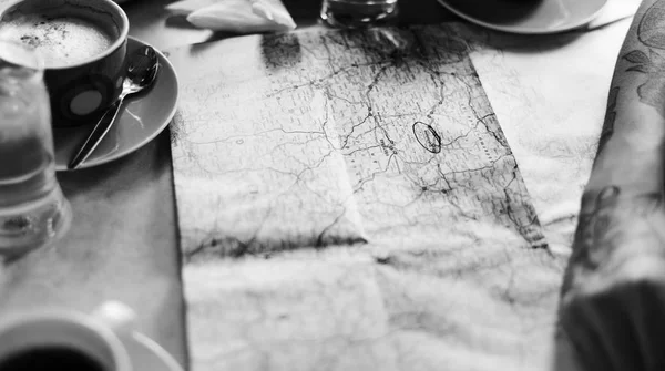 Coffee cup on the map — Stock Photo, Image