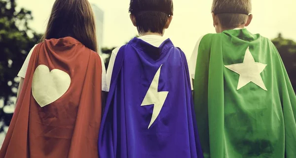 Kids in costumes superheroes — Stock Photo, Image