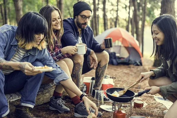 Young friends travelers in forest — Stock Photo, Image