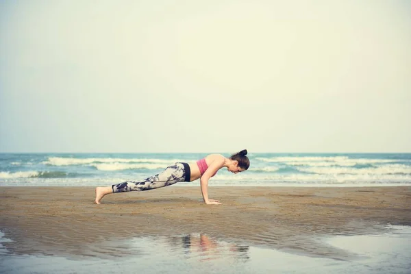 Woman doing Plank exercise — Stock Photo, Image