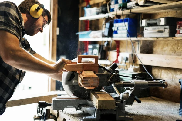 Carpenter Craftman in workshop — Stock Photo, Image