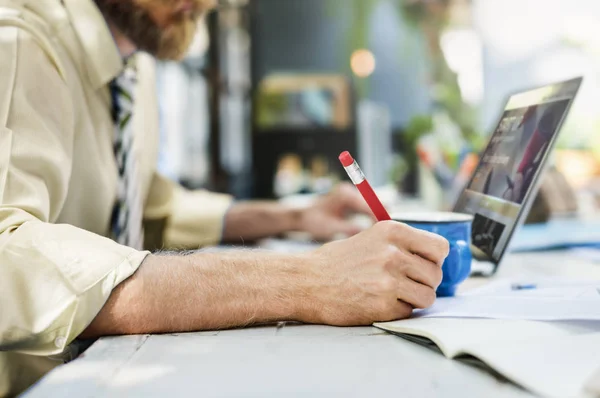 Businessman Writing in Notebook — Stock Photo, Image