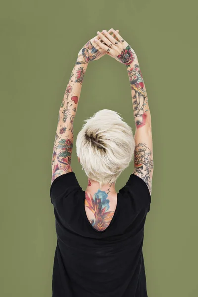 Mujer en tatuajes vista trasera — Foto de Stock