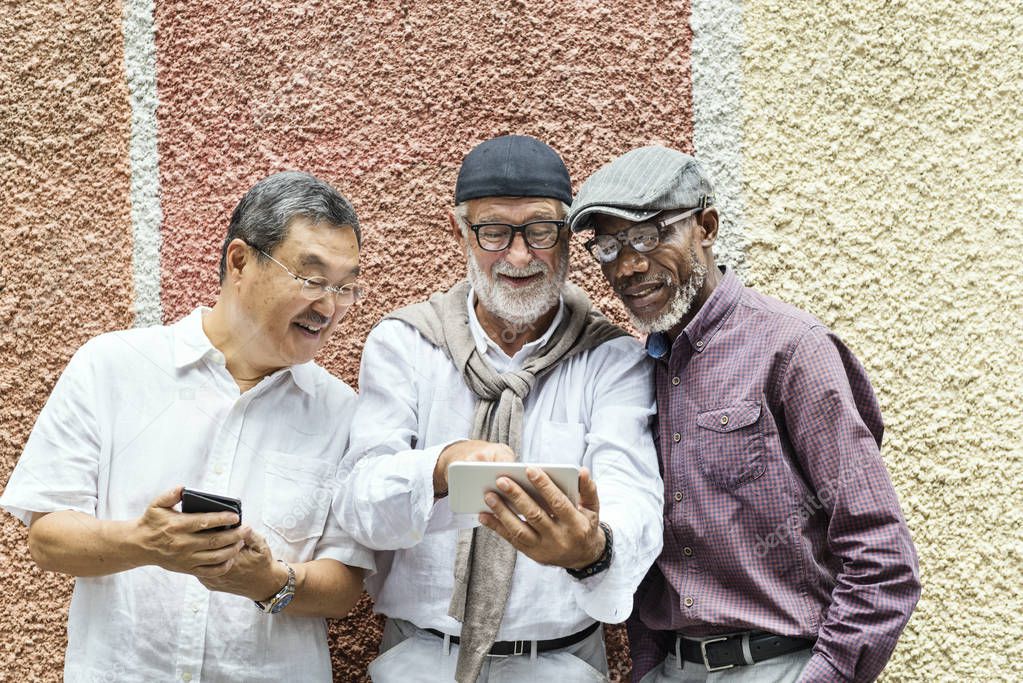 Senior men Using Digital Devices