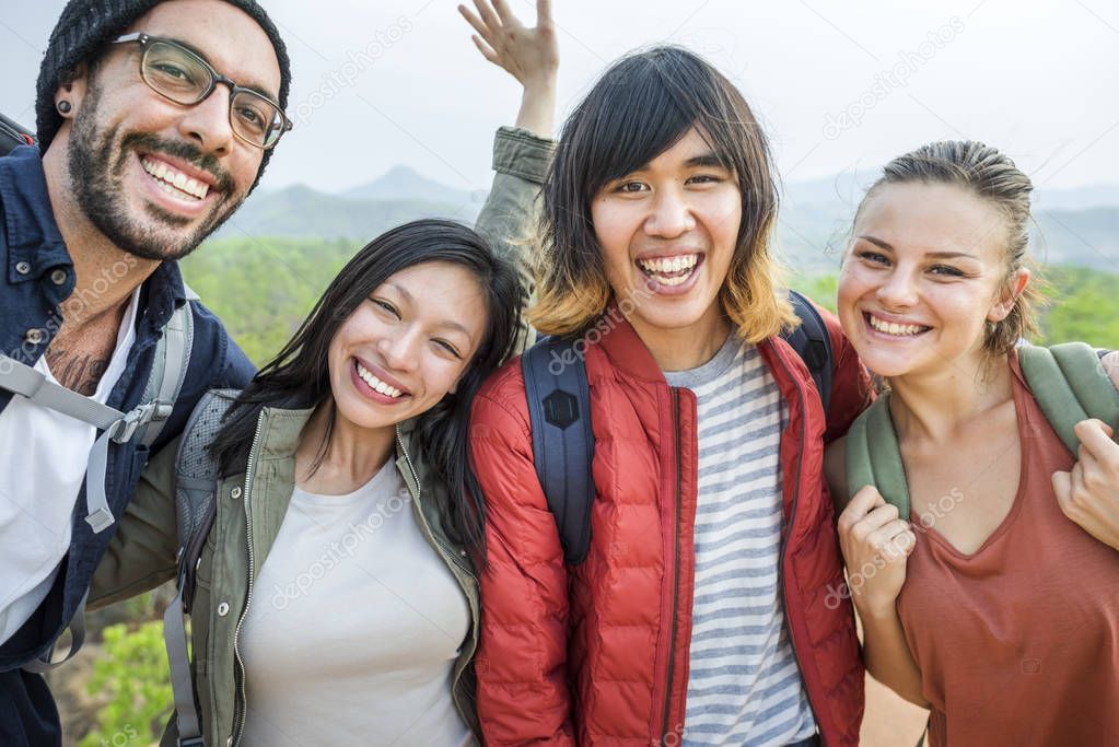 Young friends travelers in forest  