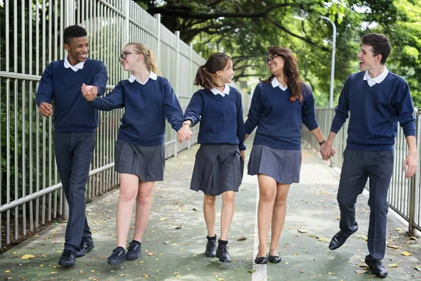 Diversi studenti in uniforme College — Foto Stock