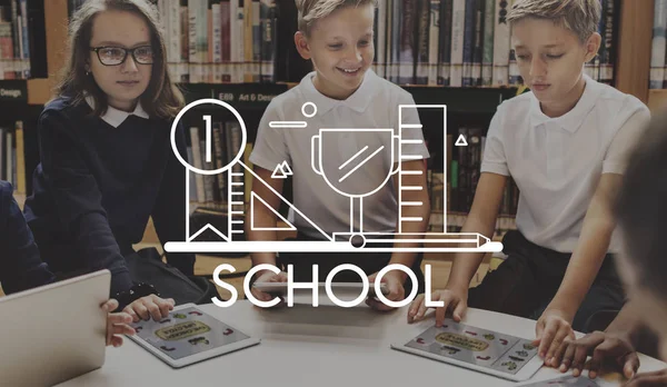 Classmates with digital tablets at school library — Stock Photo, Image