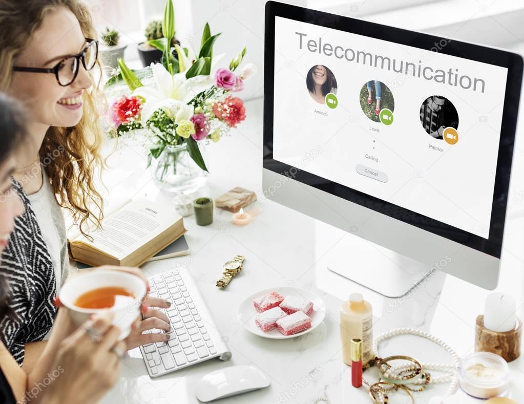 women working on computer 