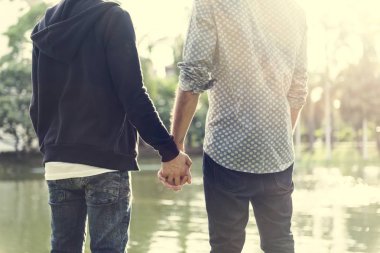 Gay Couple holding hands clipart