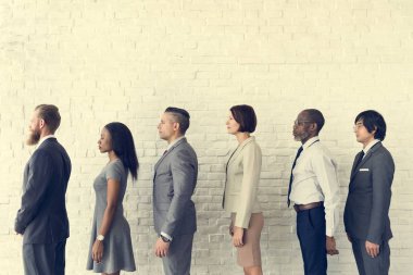 Business People Standing in Line clipart