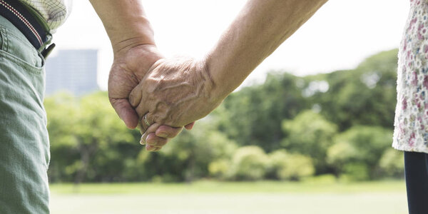 Olderly Couple Holding Hands