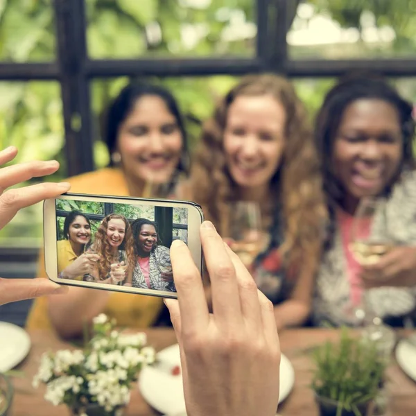 Women Taking Pictures with Device — Stock Photo, Image