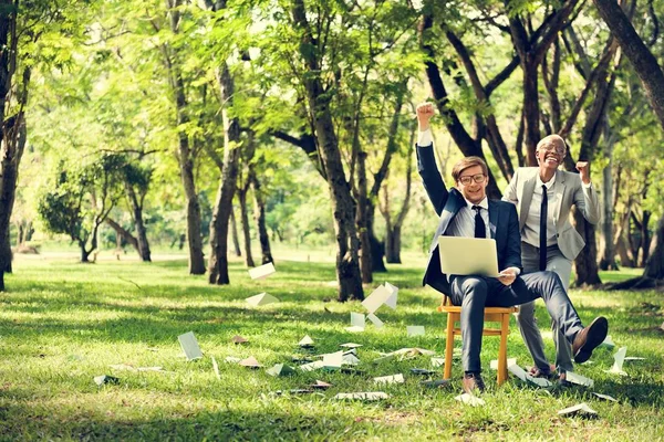 Business people throwing documents — Stock Photo, Image