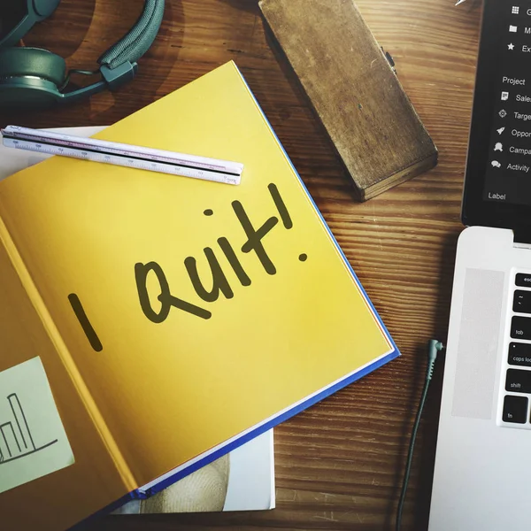 Workplace table with yellow paper diary — Stock Photo, Image