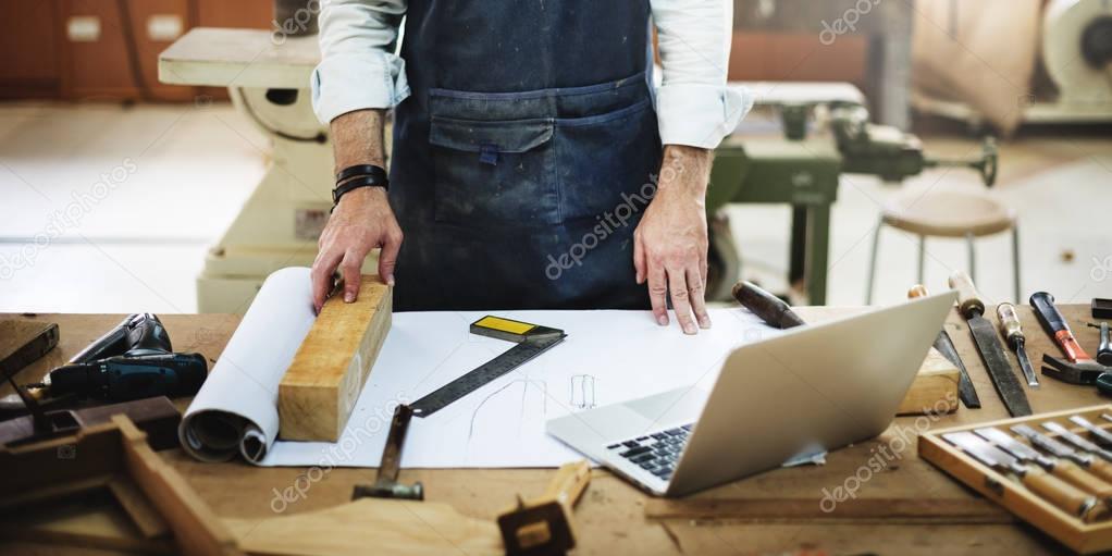 Craftsman working in workshop studio