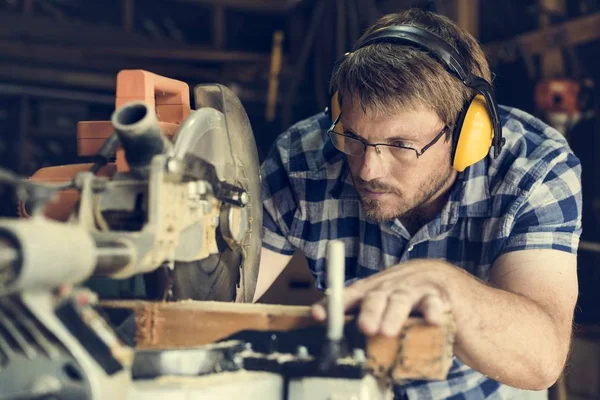 Carpenter Craftman in workshop — Stock Photo, Image