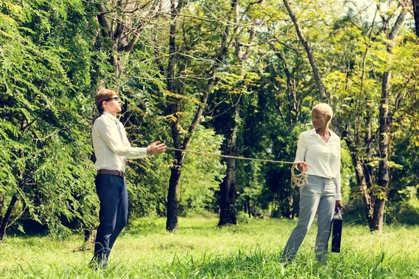 Business people in forest. — Stock Photo, Image